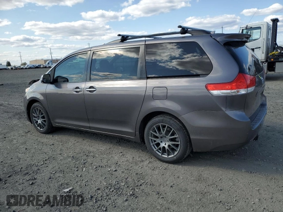 2011 Toyota Sienna XLE with VIN 5TDDK3DC2BS028058, listed as a Copart auction lot 54374215 with 216,905 mi miles and Salvage Title. Bid and sale history available at DreamBid. Image 2.