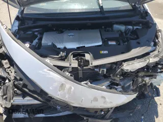 2021 Toyota Prius LE z VIN JTDKAMFPXM3169514, wystawiony jako Copart lot #63255095 z przebiegiem 49 546 mil mil oraz Szkoda całkowita • Salvage title. Historia ofert i sprzedaży dostępna na DreamBid. Obrazek 11.