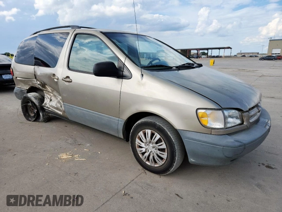 2000 Toyota Sienna LE with VIN 4T3ZF13C2YU218417, listed as a Copart auction lot 63328035 with 263,439 mi miles and Salvage title. Bid and sale history available at DreamBid. Image 4.