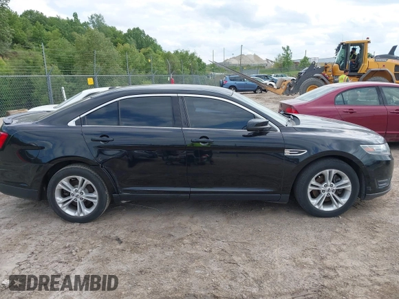 2016 Ford Taurus SEL z VIN 1FAHP2E82GG156346, wystawiony jako IAAI lot #42468616 z przebiegiem 159 425 mil mil oraz . Historia ofert i sprzedaży dostępna na DreamBid. Obrazek 13.