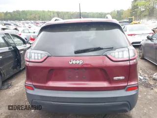 2019 Jeep Cherokee Latitude Plus with VIN 1C4PJLLB9KD434990, listed as a IAAI auction lot 41959477 with 96,283 mi miles and . Bid and sale history available at DreamBid. Image 16.