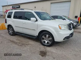 2014 Honda Pilot Touring with VIN 5FNYF4H93EB023602, listed as a IAAI auction lot 41909653 with 162,118 mi miles and . Bid and sale history available at carsss.com. Image 1.