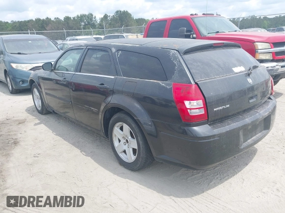 2005 Dodge Magnum SE with VIN 2D4FV48VX5H128545, listed as a IAAI auction lot 42098344 with Not Provided miles. Bid and sale history available at carsss.com. Image 3.