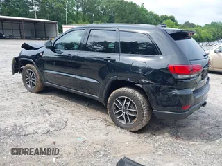 2020 Jeep Grand Cherokee Trailhawk with VIN 1C4RJFLG4LC387459, listed as a IAAI auction lot 42373820 with 55,492 mi miles and . Bid and sale history available at DreamBid. Image 3.