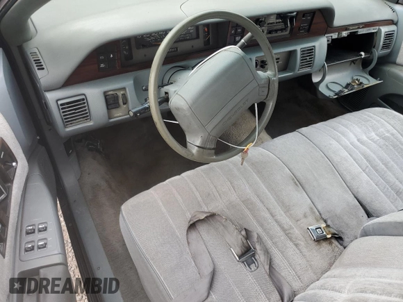 1991 Chevrolet Caprice z VIN 1G1BL83EXMW257393, wystawiony jako Copart lot #85267614 z przebiegiem 195 128 mil mil oraz Nie do naprawy • Non repairable. Historia ofert i sprzedaży dostępna na DreamBid. Obrazek 8.