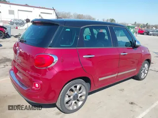 2014 FIAT 500L Lounge with VIN ZFBCFACH1EZ022517, listed as a IAAI auction lot 41783768 with 100,797 mi miles and . Bid and sale history available at DreamBid. Image 4.