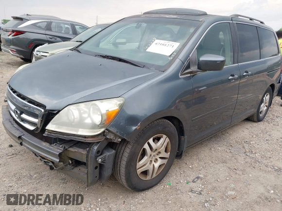 2006 Honda Odyssey EX-L z VIN 5FNRL38756B420817, wystawiony jako IAAI lot #42101271 z przebiegiem 203 892 mil mil oraz . Historia ofert i sprzedaży dostępna na DreamBid. Obrazek 18.