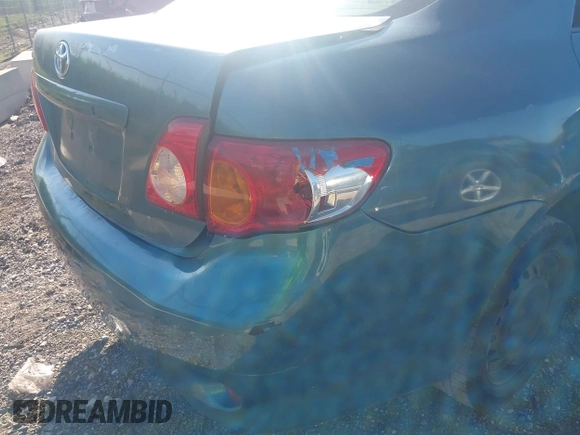 2009 Toyota Corolla with VIN 1NXBU40E39Z018168, listed as a IAAI auction lot 42661070 with 249,008 mi miles and . Bid and sale history available at DreamBid. Image 13.