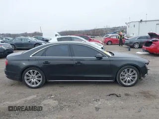 2012 Audi A8 с VIN WAUAVAFD0CN035731, выставлен на аукционе IAAI как лот 41286022 с пробегом 82 835 миль миль и . История ставок и продаж доступна на DreamBid. Изображение 14.