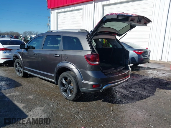 2018 Dodge Journey Crossroad with VIN 3C4PDDGG6JT499291, listed as a IAAI auction lot 41229930 with 169,539 mi miles. Bid and sale history available at carsss.com. Image 3.