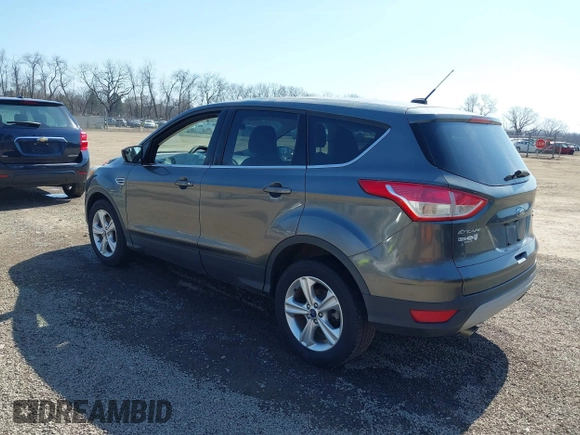2015 Ford Escape SE with VIN 1FMCU9GX1FUC19376, listed as a IAAI auction lot 41769390 with 98,334 mi miles. Bid and sale history available at carsss.com. Image 3.
