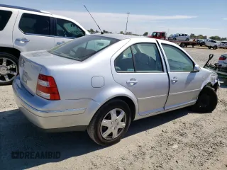 2004 Volkswagen Jetta GL z VIN 3VWRA69M54M007376, wystawiony jako Copart lot #72288984 z przebiegiem 91 687 mil mil oraz Szkoda całkowita • Salvage title. Historia ofert i sprzedaży dostępna na DreamBid. Obrazek 3.