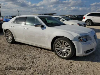 2014 Chrysler 300 with VIN 2C3CCAEG0EH166641, listed as a Copart auction lot 43961855 with 125,655 mi miles and Salvage Title. Bid and sale history available at carsss.com. Image 4.