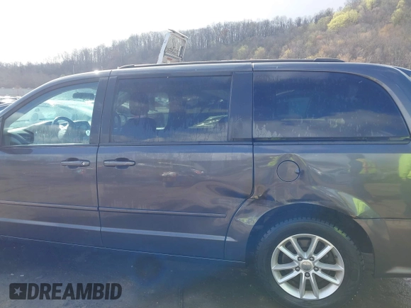 2015 Dodge Grand Caravan SXT with VIN 2C4RDGCG8FR541373, listed as a IAAI auction lot 41990500 with 114,100 mi miles and . Bid and sale history available at DreamBid. Image 6.