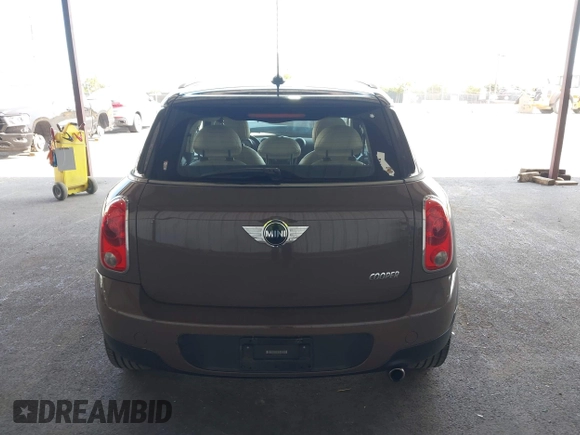 2012 MINI Countryman with VIN WMWZB3C51CWM04563, listed as a IAAI auction lot 42564564 with 95,760 mi miles and . Bid and sale history available at DreamBid. Image 16.