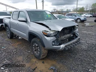 2016 Toyota Tacoma SR with VIN 5TFCZ5AN5GX026458, listed as a IAAI auction lot 41975246 with 208,401 mi miles and . Bid and sale history available at DreamBid. Image 1.