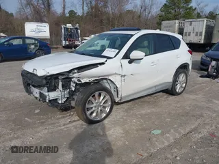 2014 Mazda CX-5 Grand Touring with VIN JM3KE4DY0E0343777, listed as a IAAI auction lot 41464395 with 126,214 mi miles. Bid and sale history available at carsss.com. Image 2.