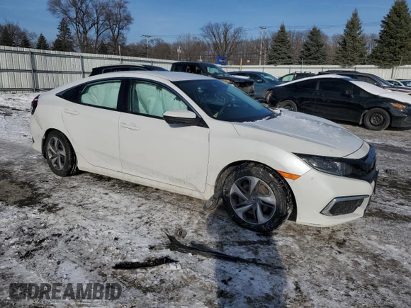 2021 Honda Civic Sedan LX with VIN 2HGFC2F63MH550062, listed as a Copart auction lot 86590674 with 56,930 mi miles and Non Repairable. Bid and sale history available at carsss.com. Image 4.