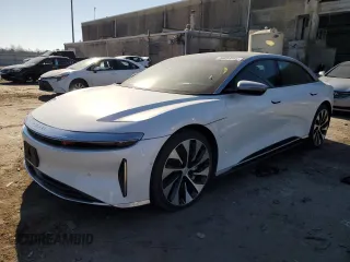 2022 Lucid Air Grand Touring z VIN 50EA1GBA5NA004784, wystawiony jako Copart lot #46854065 z przebiegiem 16 471 mil mil oraz Szkody całkowita. Historia ofert i sprzedaży dostępna na DreamBid. Obrazek 1.