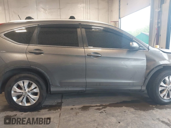 2012 Honda CR-V EX-L z VIN JHLRM4H78CC017235, wystawiony jako IAAI lot #42318504 z przebiegiem 161 069 mil mil oraz . Historia ofert i sprzedaży dostępna na DreamBid. Obrazek 13.