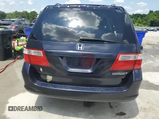 2005 Honda Odyssey EX-L z VIN 5FNRL38775B014777, wystawiony jako Copart lot #56245735 z przebiegiem 222 798 mil mil oraz Szkoda całkowita • Salvage title. Historia ofert i sprzedaży dostępna na DreamBid. Obrazek 6.