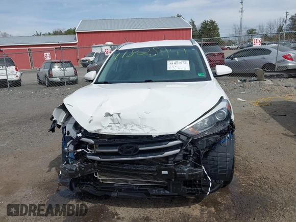 2017 Hyundai Tucson SE with VIN KM8J3CA44HU437644, listed as a IAAI auction lot 41825957 with 59,402 mi miles. Bid and sale history available at carsss.com. Image 13.