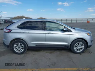 2018 Ford Edge SEL with VIN 2FMPK4J8XJBB66848, listed as a IAAI auction lot 41890423 with 142,887 mi miles and . Bid and sale history available at DreamBid. Image 14.