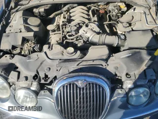 2003 Jaguar S-Type z VIN SAJEA01U03HM57757, wystawiony jako Copart lot #73440434 z przebiegiem 188 389 mil mil oraz Szkoda całkowita • Salvage title. Historia ofert i sprzedaży dostępna na DreamBid. Obrazek 11.