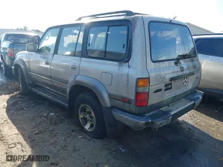 1997 Toyota Land Cruiser with VIN JT3HJ85J0V0186845, listed as a IAAI auction lot 41216993 with 278,082 mi miles. Bid and sale history available at carsss.com. Image 3.