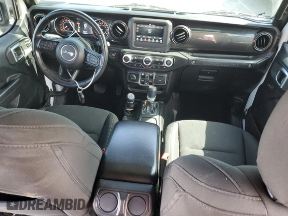 2019 Jeep Wrangler Unlimited Sport Altitude with VIN 1C4HJXDG2KW675235, listed as a Copart auction lot 54389785 with 88,825 mi miles and Salvage title. Bid and sale history available at DreamBid. Image 8.