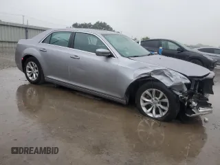 2015 Chrysler 300 Limited with VIN 2C3CCAAG8FH801869, listed as a Copart auction lot 54488135 with 190,019 mi miles and Salvage Title. Bid and sale history available at DreamBid. Image 4.
