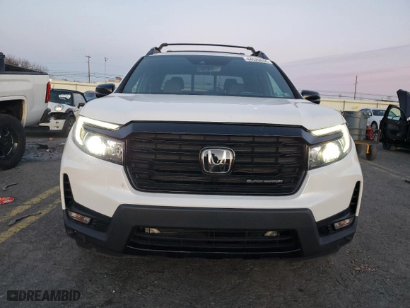 2023 Honda Ridgeline Black Edition with VIN 5FPYK3F8XPB025230, listed as a Copart auction lot 84520634 with 12,026 mi miles and Salvage Title. Bid and sale history available at carsss.com. Image 5.