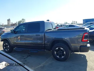 2022 Ram 1500 Rebel z VIN 1C6SRFLT4NN177112, wystawiony jako IAAI lot #42402050 z przebiegiem 26 239 mil mil oraz . Historia ofert i sprzedaży dostępna na DreamBid. Obrazek 14.