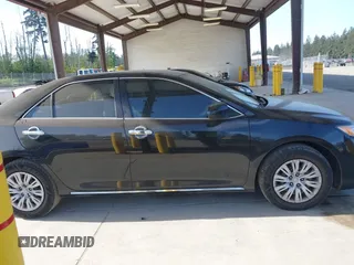 2012 Toyota Camry L z VIN 4T4BF1FK8CR271280, wystawiony jako IAAI lot #42229436 z przebiegiem 165 620 mil mil oraz . Historia ofert i sprzedaży dostępna na DreamBid. Obrazek 13.