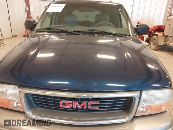 2000 GMC Jimmy Diamond Edition Luxury with VIN 1GKDT13W7Y2398987, listed as a IAAI auction lot 42035344 with 189,594 mi miles. Bid and sale history available at carsss.com. Image 6.