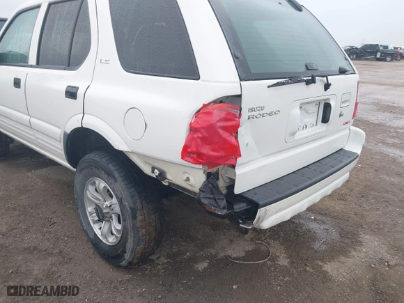 2001 Isuzu Rodeo S with VIN 4S2DM58WX14315138, listed as a IAAI auction lot 41535619 with 217,960 mi miles. Bid and sale history available at carsss.com. Image 6.