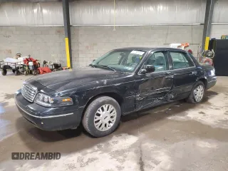 2003 Ford Crown Victoria LX z VIN 2FAFP74W43X109103, wystawiony jako Copart lot #61750155 z przebiegiem 51 954 mil mil oraz Szkoda całkowita • Salvage title. Historia ofert i sprzedaży dostępna na DreamBid. Obrazek 1.
