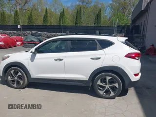 2016 Hyundai Tucson Eco with VIN KM8J3CA22GU076489, listed as a IAAI auction lot 42169732 with 153,597 mi miles. Bid and sale history available at carsss.com. Image 14.