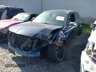 2016 Chrysler 300 with VIN 2C3CCAKG0GH111467, listed as a IAAI auction lot 41695660 with 1 mi miles. Bid and sale history available at carsss.com. Image 2.