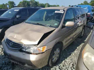 2002 Honda Odyssey EX z VIN 2HKRL18682H577913, wystawiony jako Copart lot #54824225 z przebiegiem 237 611 mil mil oraz Szkoda całkowita • Salvage title. Historia ofert i sprzedaży dostępna na DreamBid. Obrazek 1.