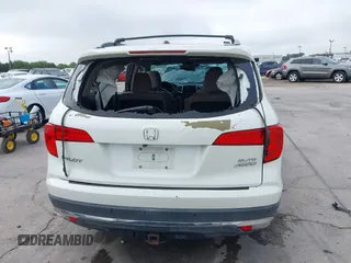 2016 Honda Pilot Elite with VIN 5FNYF6H00GB104329, listed as a IAAI auction lot 41905390 with 125,501 mi miles. Bid and sale history available at carsss.com. Image 16.