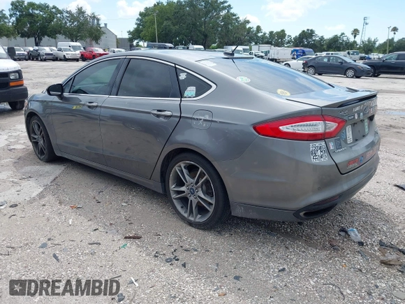 2013 Ford Fusion Titanium with VIN 3FA6P0K96DR131317, listed as a IAAI auction lot 42552736 with 154,762 mi miles and . Bid and sale history available at DreamBid. Image 3.