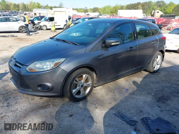 2013 Ford Focus SE with VIN 1FADP3K21DL341348, listed as a IAAI auction lot 42035450 with 179,517 mi miles. Bid and sale history available at carsss.com. Image 2.