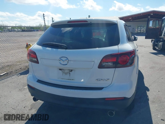 2015 Mazda CX-9 Sport with VIN JM3TB2BV3F0455632, listed as a IAAI auction lot 41881026 with 102,201 mi miles and . Bid and sale history available at carsss.com. Image 16.