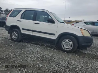 2004 Honda CR-V LX with VIN SHSRD68434U205205, listed as a Copart auction lot 50465065 with 113,312 mi miles and Salvage Title. Bid and sale history available at DreamBid. Image 4.