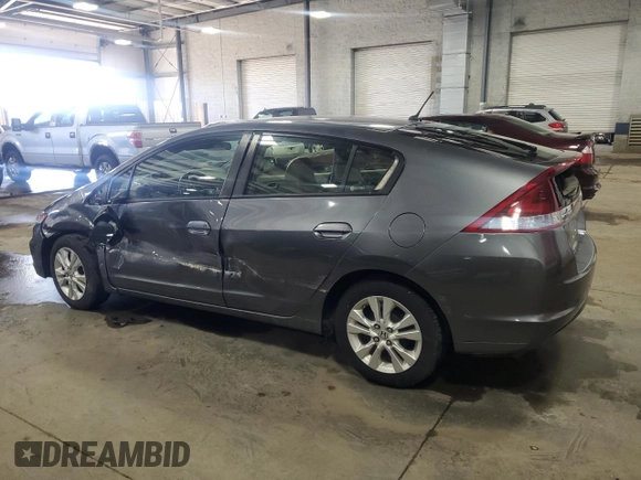 2013 Honda Insight EX with VIN JHMZE2H77DS001810, listed as a Copart auction lot 43332675 with 97,508 mi miles and Salvage title. Bid and sale history available at DreamBid. Image 2.