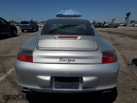 2003 Porsche 911 with VIN WP0BA29923S635457, listed as a Copart auction lot 61446545 with 85,602 mi miles and Salvage title. Bid and sale history available at DreamBid. Image 6.