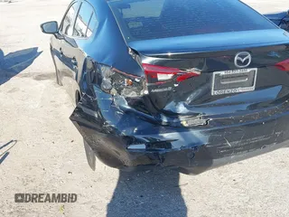2015 Mazda Mazda3 i Touring with VIN 3MZBM1V73FM207770, listed as a IAAI auction lot 41749926 with 106,522 mi miles. Bid and sale history available at carsss.com. Image 17.
