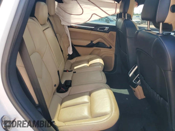 2016 Porsche Cayenne z VIN WP1AA2A26GLA09807, wystawiony jako Copart lot #59619335 z przebiegiem 102 327 mil mil oraz Szkoda całkowita • Salvage title. Historia ofert i sprzedaży dostępna na DreamBid. Obrazek 11.