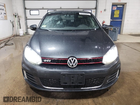 2013 Volkswagen GTI с VIN WVWGD7AJXDW129840, выставлен на аукционе Copart как лот 52946845 с пробегом 118 520 миль миль и Списание • Salvage title. История ставок и продаж доступна на DreamBid. Изображение 5.